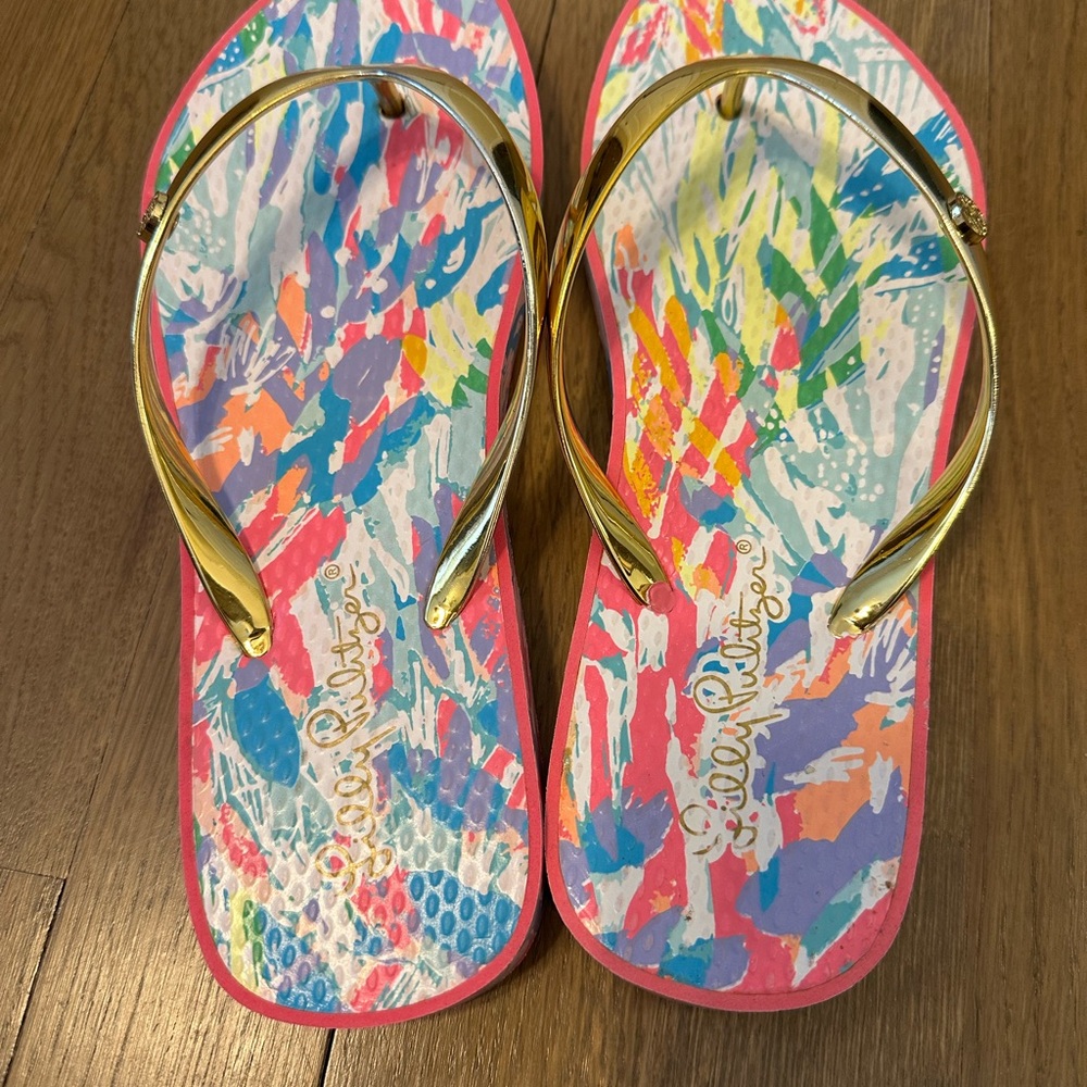 Lily Pulitzer flip flops with gold straps